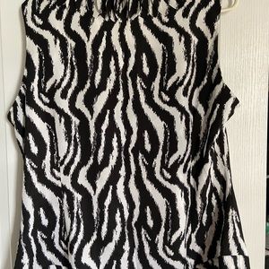 Black and white animal print woman’s top.
